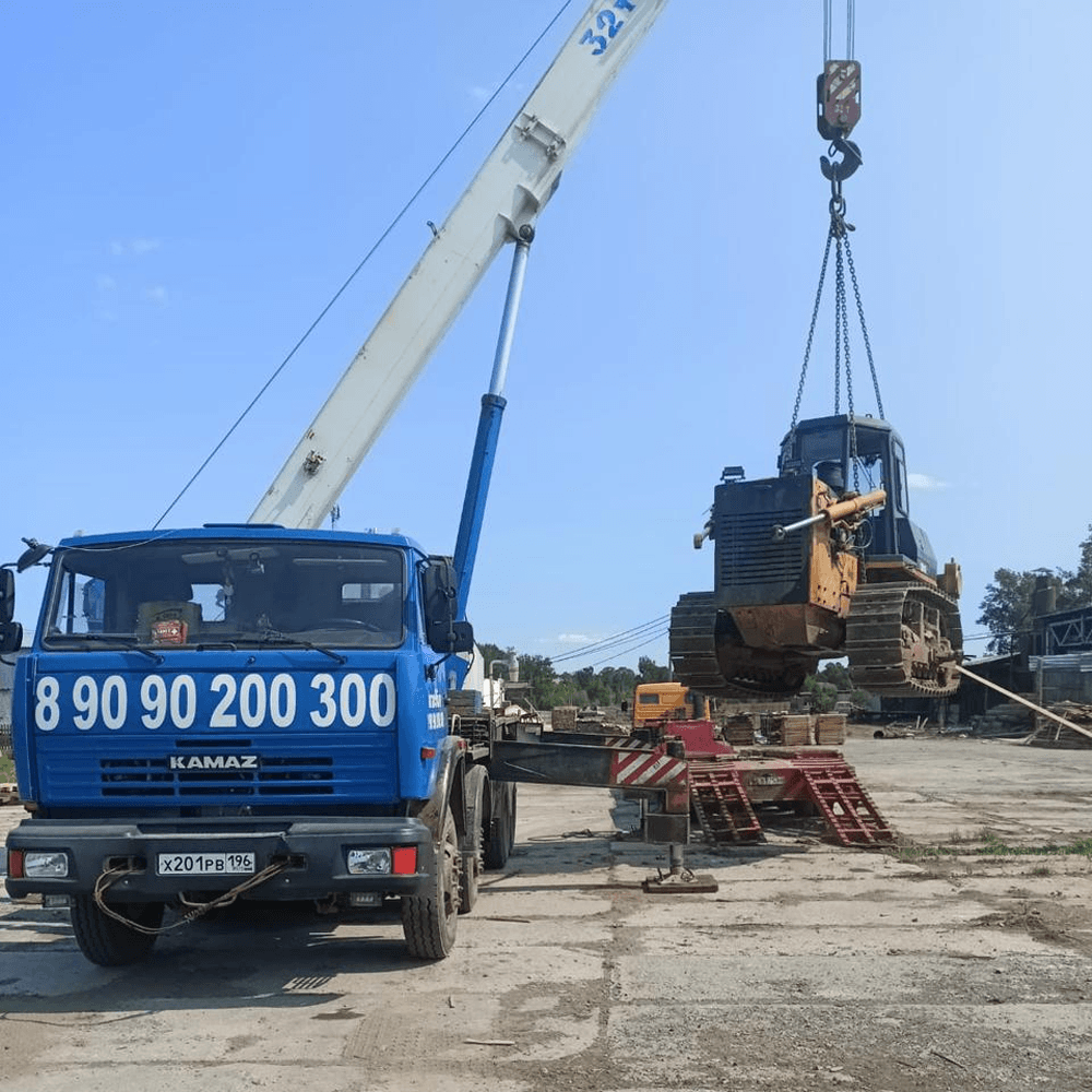 Синий автокран КС 55729-1В 32 тонны, 31 метр
